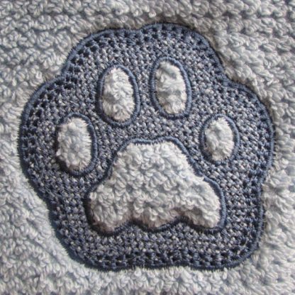 Embossed Paw Print Machine Embroidery Design by Erich Campbell